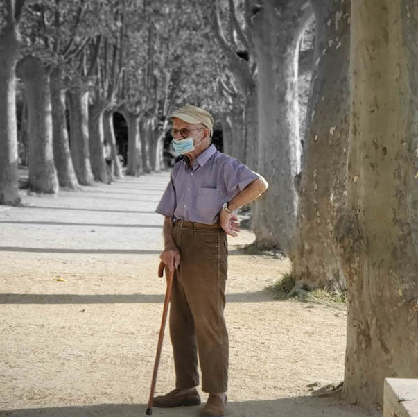 Puzzled Old Man With Cane